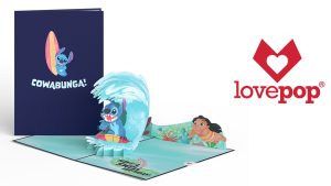 On the left side of the image is the front of a propped-up card with Stitch leaning up against a surfboard. Below him is the text that says “COWABUNGA!”. The vertical card is sitting on a version of the same greeting card that is flat & opened up. Inside the card is a laser-cut paper version of Stitch surfing on a wave with a big smile on his face. Lilo is toward the back of the card, swimming after Stitch. To the far right of the image is the Lovepop logo, which features a heart symbol inside a red laser-cut heart outline. The words “lovepop®” are written below it.