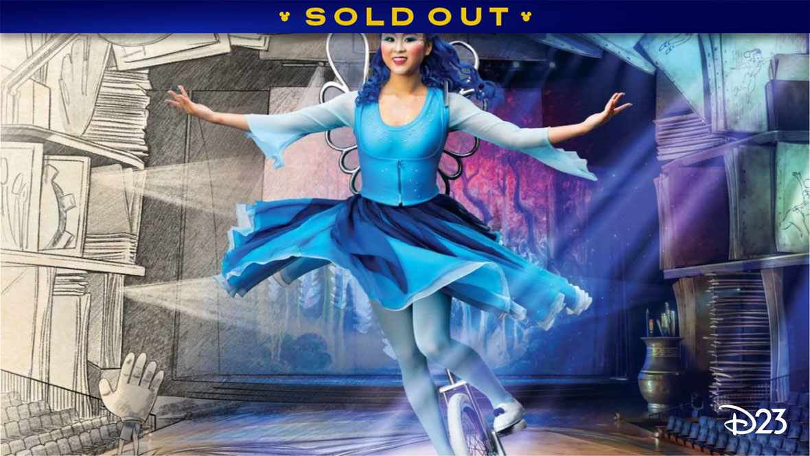 A promotional image for Drawn to Life presented by Cirque du Soleil and Disney at Disney Springs in Orlando, Florida. The left side of the image features a hand-drawn theater, with rows of seats sketched by pencil with monochrome shading. The right side of the image transitions from the hand-drawn style into a full color photo of a theater stage. The stage is framed by large pages from a sketchbook, and as the image moves from left to right, the sketches move from a hand-drawn style to being in color. In the foreground of the image is a Drawn to Life performer and character, representing the Blue Fairy from Pinocchio during a unicycle act. The female-presenting character is in a flowy dress in shades of blue and wearing a dark blue wig and silver wings. While on the unicycle, the character evokes action and grace. The D23 logo is in the bottom right corner in white. A banner at the top reads SOLD OUT.
