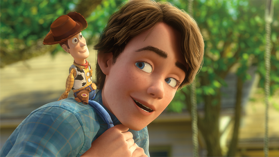 Andy and Woody from Toy Story 3 (2010). Andy has placed Woody on his shoulders and is looking back at him.