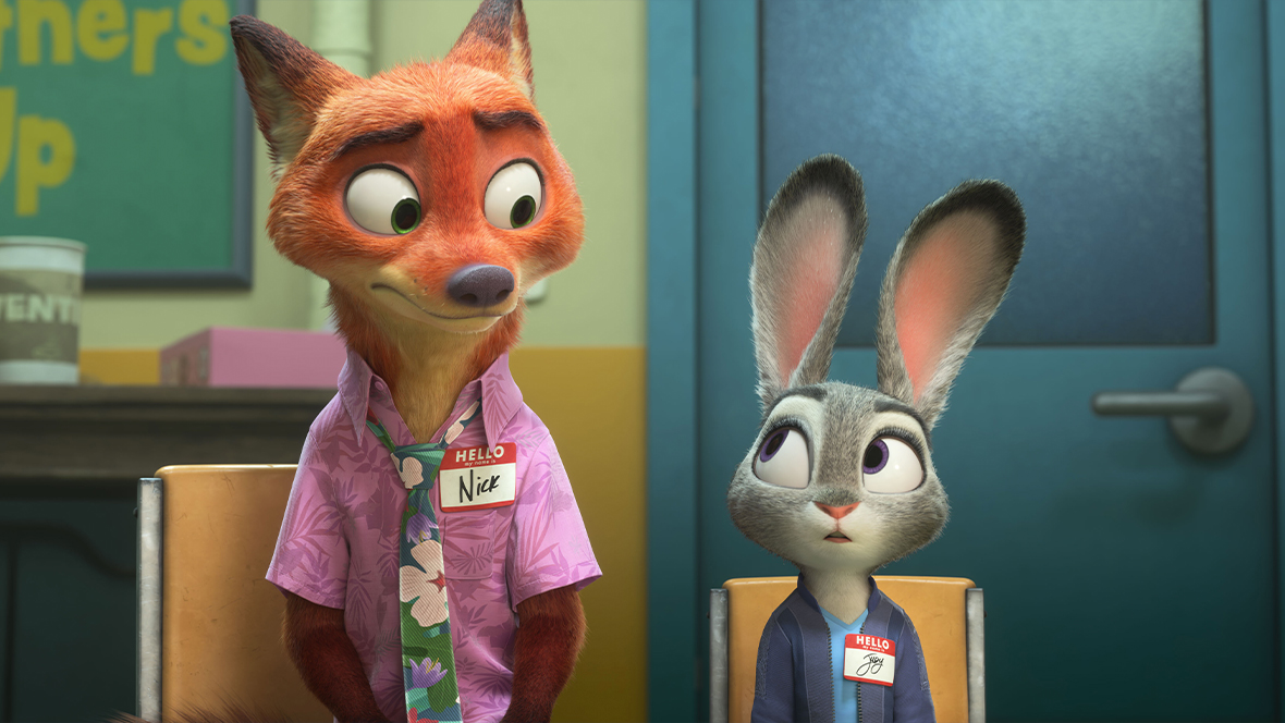 The fox Nick Wilde (voiced by Jason Bateman) sits beside the bunny Judy Hopps (voiced by Ginnifer Goodwin) in a partners counseling session. Both are wearing nametags.