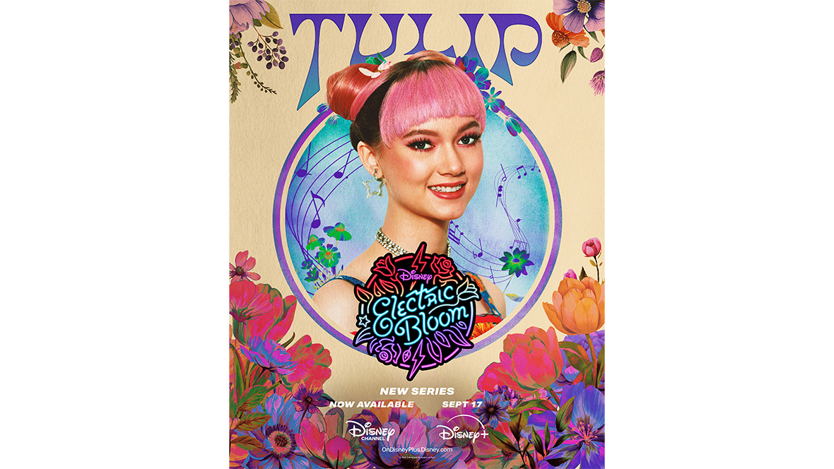 A closeup of Tulip, played by Ruby Marino, is framed in a circle and appears in the center of the character poster. Ruby’s name appears above her head, and the Disney Electric Bloom logo appears below it. The entire poster is framed by vibrant flowers.