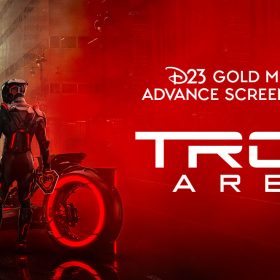 A background of a sepia tone city landscape on the left-hand side of the image. In the foreground is a red Lightcycle with a driver in a black light suit standing in front of it. The right side of the image is washed in the same red as the Lightcycle, and in white text reads: “D23 Gold Member Advance Screenings of TRON: Ares.”