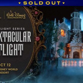 An image promoting D23’s upcoming Spooktacular Spotlight event. On the left side of the image is a vintage gold frame of a “magic” mirror; inside the mirror is shimmery grey text that reads “D23 Spotlight Series: A Spooktacular Spotlight.” Above this text are the D23 and the Walt Disney Archives logos in gold. Below the text, also in gold, is the date of the event and the location: October 12, Walt Disney World Resort. On the right side of the image is a photo of the Haunted Mansion attraction at the Magic Kingdom at Walt Disney World Resort. A banner at the top reads SOLD OUT.