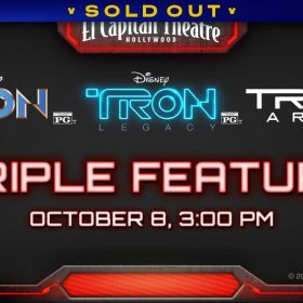 A red glowing light borders a black backdrop, with the “El Capitan Theatre” at the top. In the middle of the image are three logos for the films TRON, TRON: Legacy, and TRON: Ares. At the bottom of the image, glowing red text reads “Triple Feature October 8 3:00 PM.” A banner at the top reads SOLD OUT.