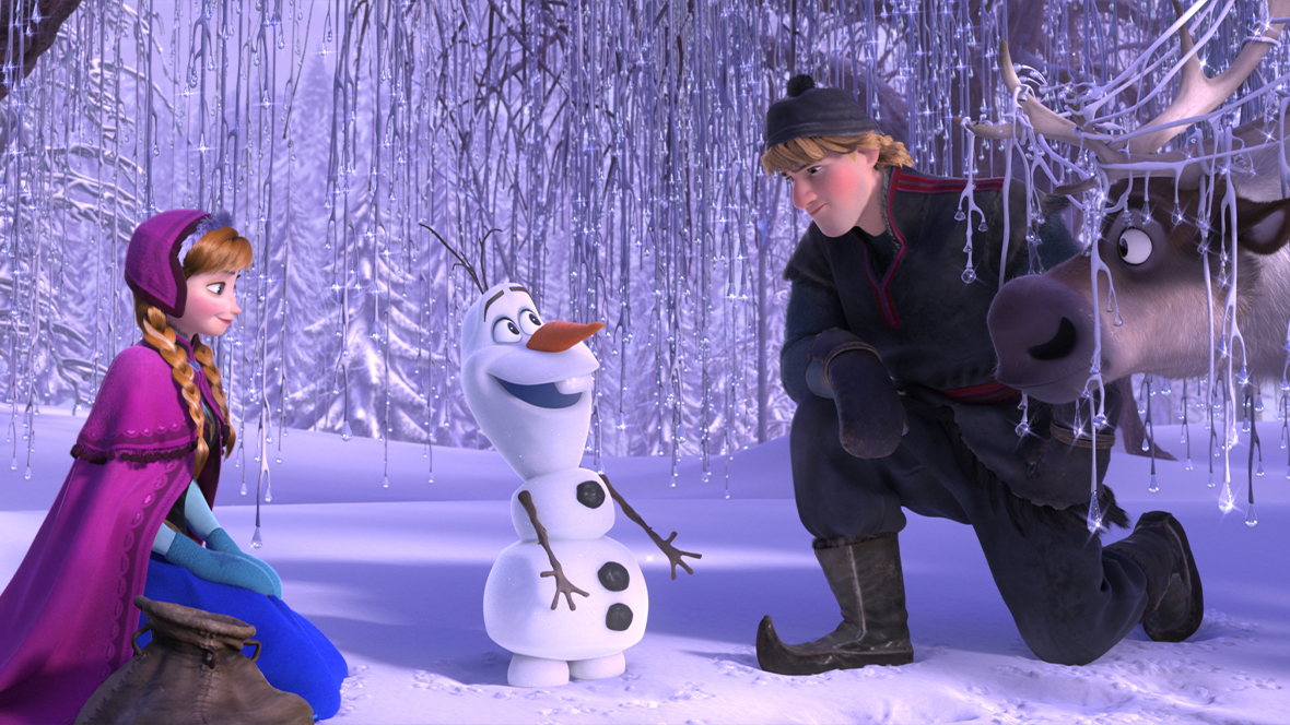 Anna (played by Kristin Bell), Olaf (played by Josh Gad), Kristoff (played by Jonathon Groff), and Sven standing in a snowy forest in a still from Frozen.