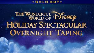 A dark blue background has dimly lit stars scattered throughout. Along the bottom are lighter blue fluffy clouds. In bright gold letters with twinkles attached to various letters, reads “The Wonderful World of Disney Holiday Spectacular Overnight Taping.” A banner at the top reads "SOLD OUT."