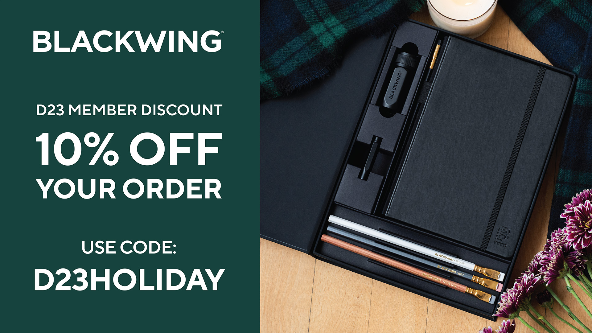 Image showcasing a sketchbook with assorted Blackwing pencils, all tucked into a black carrying case. To the left is copy that reads: Blackwing, D23 Member Discount, 10% Off Your Order, Use Code: D23HOLIDAY.