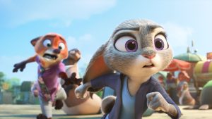 A still from Walt Disney Animation Studios&rsquo; Zootopia 2 features Judy Hopps (voiced by Ginnifer Goodwin) running at something off screen to the right. Behind her is Nick Wilde (voiced by Jason Bateman); he&rsquo;s trying to grab at her arm.
