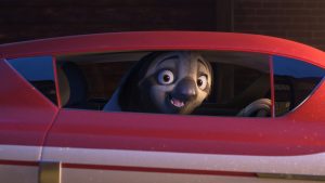 A still from Walt Disney Animation Studios&rsquo; Zootopia 2 features Flash; he&rsquo;s behind the wheel of a car and smiling widely.
