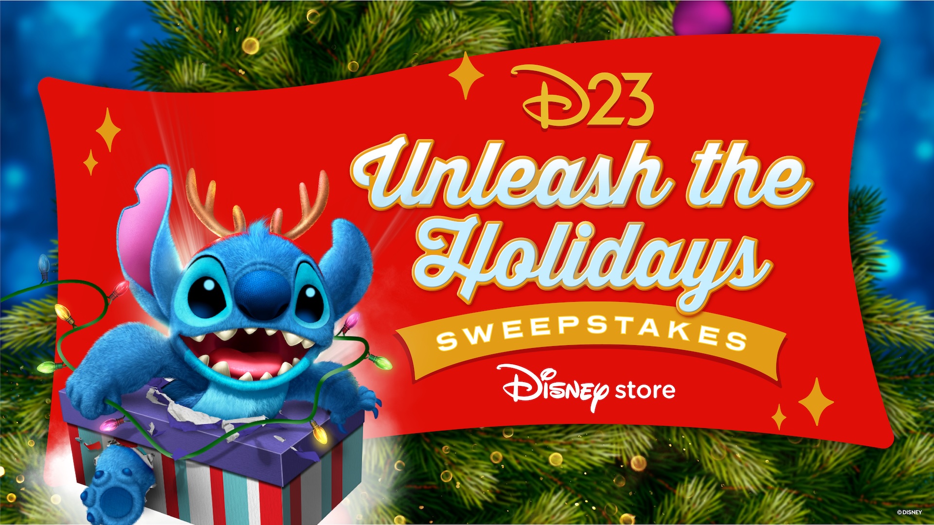 Festive holiday graphic featuring Stitch wearing reindeer antlers as he bursts out of a gift box tangled in colorful string lights, with a red banner reading &lsquo;D23 Unleash the Holidays Sweepstakes&rsquo; and a decorated Christmas tree in the background.