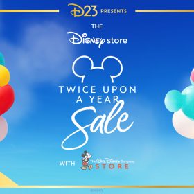 A promotional image for D23 Presents: The Disney Studio Store Twice Upon a Year Sale, against a sky-blue background. There are colorful balloons on the left and right of the text. On the bottom left of the graphic are the words &ldquo;The Walt Disney Studios Lot,&rdquo; and on the bottom right, &ldquo;January 11th.&rdquo;
