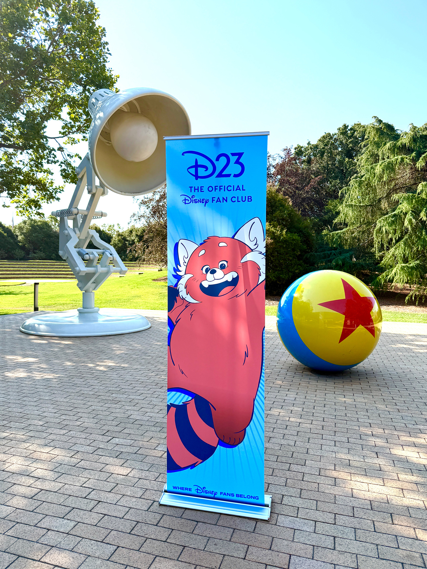 D23&rsquo;s 2025 Gold Member tour of Pixar Animation Studios, including a D23 sign in front of the iconic Luxo Jr. lamp and ball