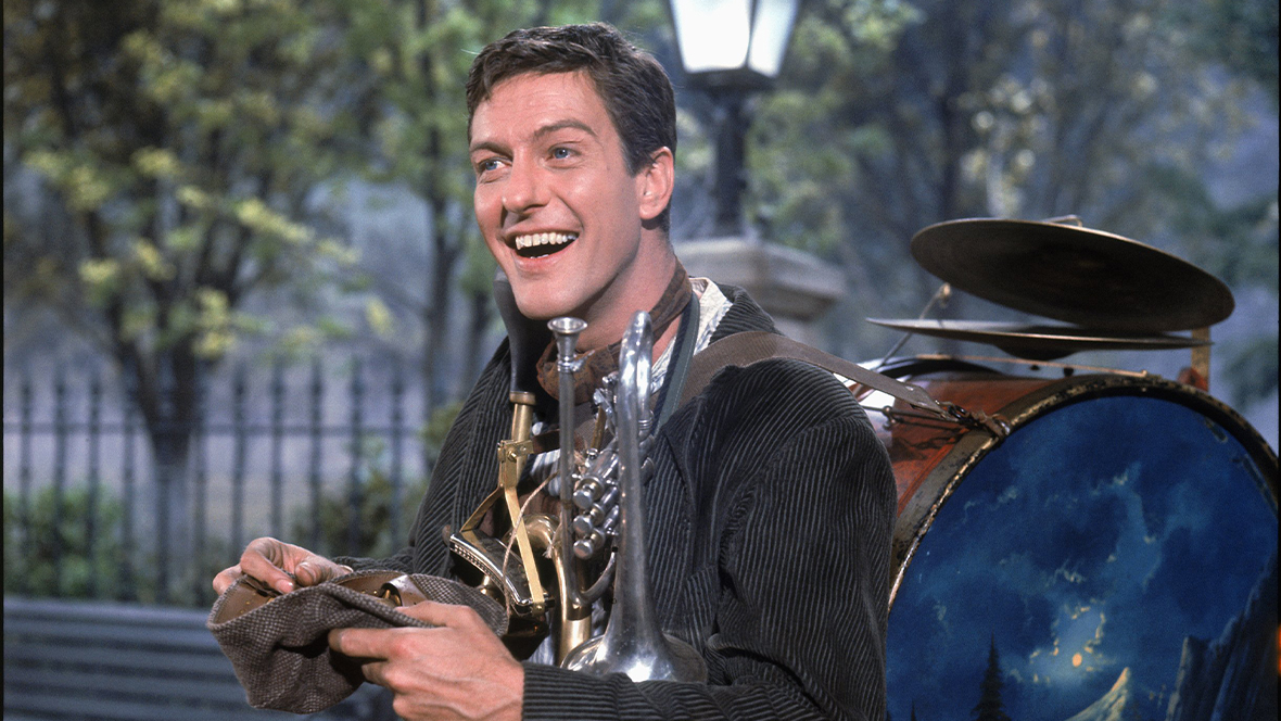 This Saturday, December 13, Disney Legend Dick Van Dyke turns an incredible 100 years old! Inducted as a Legend in 1998, Van Dyke is perhaps best known to Disney fans as Bert in 1964’s Mary Poppins, starring fellow Disney Legend Julie Andrews. (He would later memorably appear in the film’s sequel, 2018’s Mary Poppins Returns.) But that wasn’t Van Dyke’s only adventure through the worlds of Disney... He’s starred in several other Disney films; hosted an installment of ABC’s The Wonderful World of Disney; gave voice to a Disney Junior animated character; and more! To mark such an auspicious occasion, we’re “stepping in time” down memory lane and looking at some of Van Dyke’s Disney history.