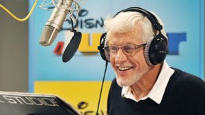 An image of Disney Legend Dick Van Dyke, with headphones on, as he is recording the voice of Captain Goof-Beard for Disney Junior&rsquo;s Mickey Mouse Clubhouse in 2014.
