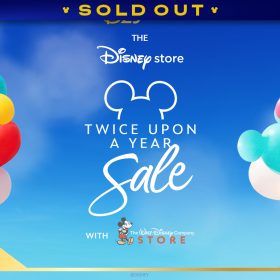 A promotional image for D23 Presents: The Disney Studio Store Twice Upon a Year Sale, against a sky-blue background. There are colorful balloons on the left and right of the text. On the bottom left of the graphic are the words &ldquo;The Walt Disney Studios Lot,&rdquo; and on the bottom right, &ldquo;January 11th.&rdquo; A banner at the top reads SOLD OUT.