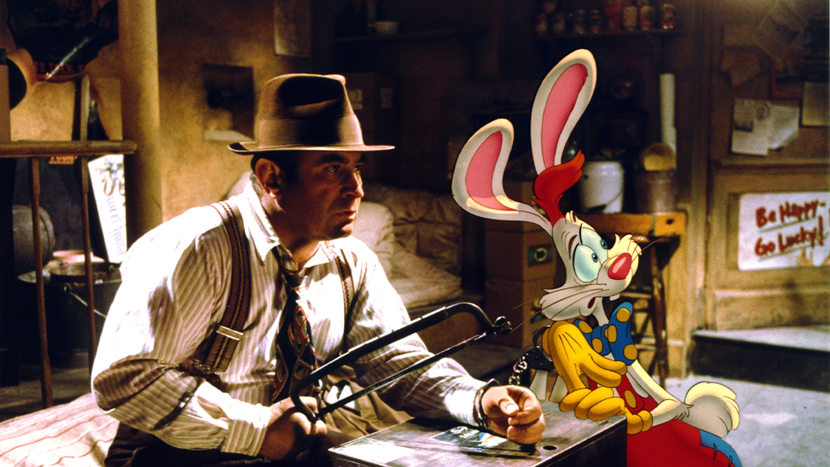 An image of Eddie (Bob Hoskins) and Roger Rabbit (voiced by Charles Fleischer) in Disney&rsquo;s Who Framed Roger Rabbit.