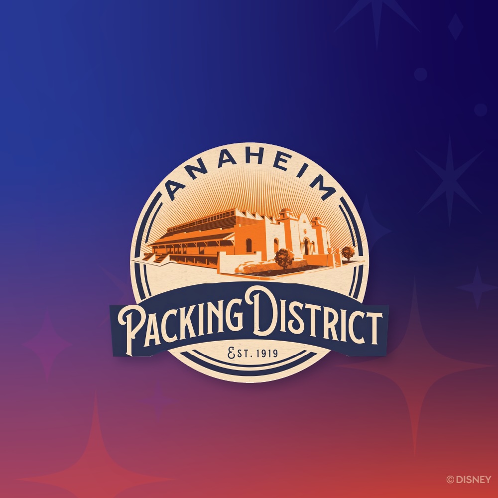 Anaheim Packing District logo featuring an illustrated historic building and the text "Anaheim Packing District Est. 1919" on a purple and orange background.