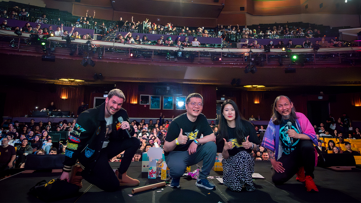 An image from the recent Marvel Rivals Assemble event at the El Capitan Theatre in Hollywood, CA, announcing the upcoming &ldquo;Path to Doomsday&rdquo;; Marvel Games executive producer Danny Koo is seen on the far right, with several other folks on stage and with the El Capitan audience behind them. 