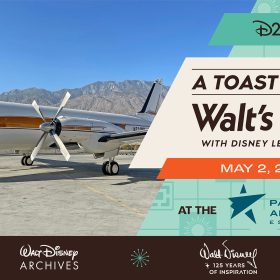 Promotional graphic for &ldquo;D23 Presents A Toast to Walt&rsquo;s Plane.&rdquo; On the left, Walt Disney&rsquo;s restored company aircraft, Mickey Mouse One, is parked on the tarmac with desert mountains in the background under a clear blue sky. On the right, a retro‑inspired graphic panel reads &ldquo;A Toast to Walt&rsquo;s Plane with Disney Legend Bob Gurr,&rdquo; with the date &ldquo;May 2, 2026&rdquo; and the text &ldquo;At the Palm Springs Air Museum.&rdquo; The D23, Walt Disney Archives, and &ldquo;Walt Disney: 125 Years of Inspiration&rdquo; logos appear along the bottom.