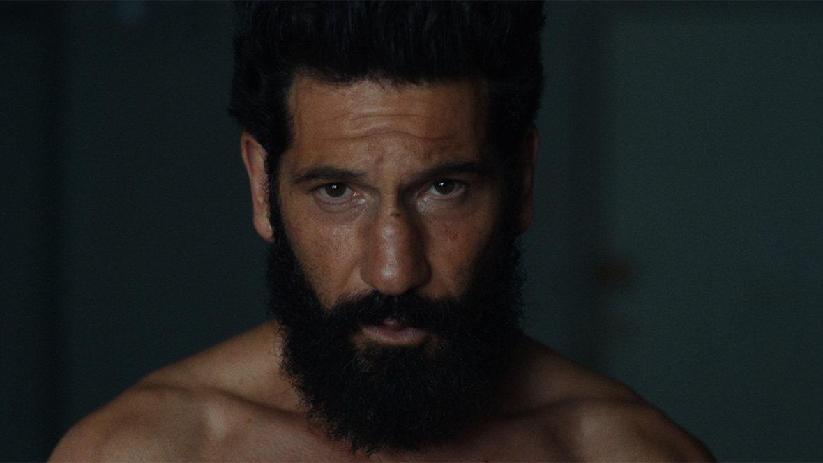 A closeup of Frank Castle/The Punisher, played by Jon Bernthal, in scene from A Marvel Television Special Presentation: The Punisher: One Last Kill on Disney+