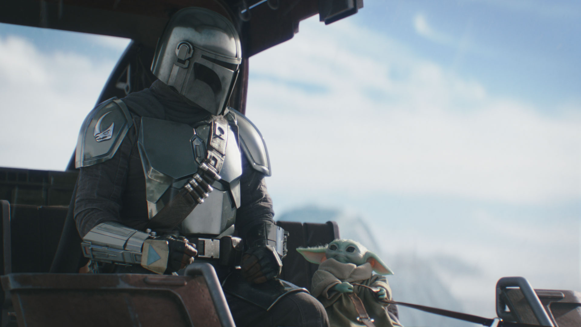 A still from Star Wars: The Mandalorian and Grogu featuring Din Djarin (Pedro Pascal), left, and Grogu, right.