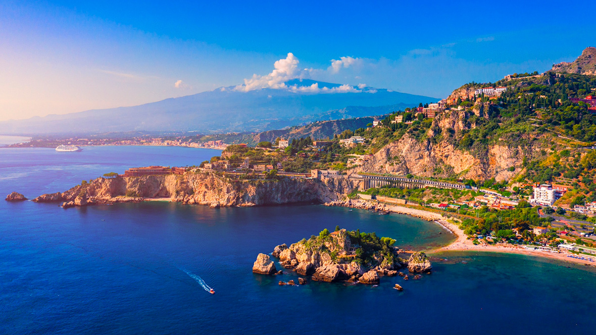 An image of the coastline in Taormina, part of the reimagined Italy: Sicily & Amalfi Coast itinerary with Adventures by Disney.