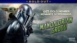 The Mandalorian and Grogu stand together against a cloudy sky with text reading "SOLD OUT D23 Gold Member Advance Screenings" and "The Star Wars Mandalorian and Grogu," plus a PG-13 rating.