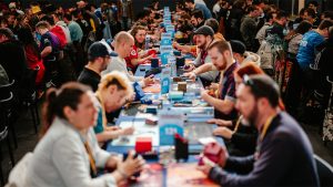 A group of people playing Lorcana.