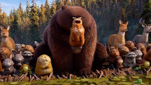 In a still image from Disney and Pixar&rsquo;s Hoppers, Mabel Beaver (voiced by Piper Curda) is being held up in the mouth of a bear, and is surrounded by many other animals.