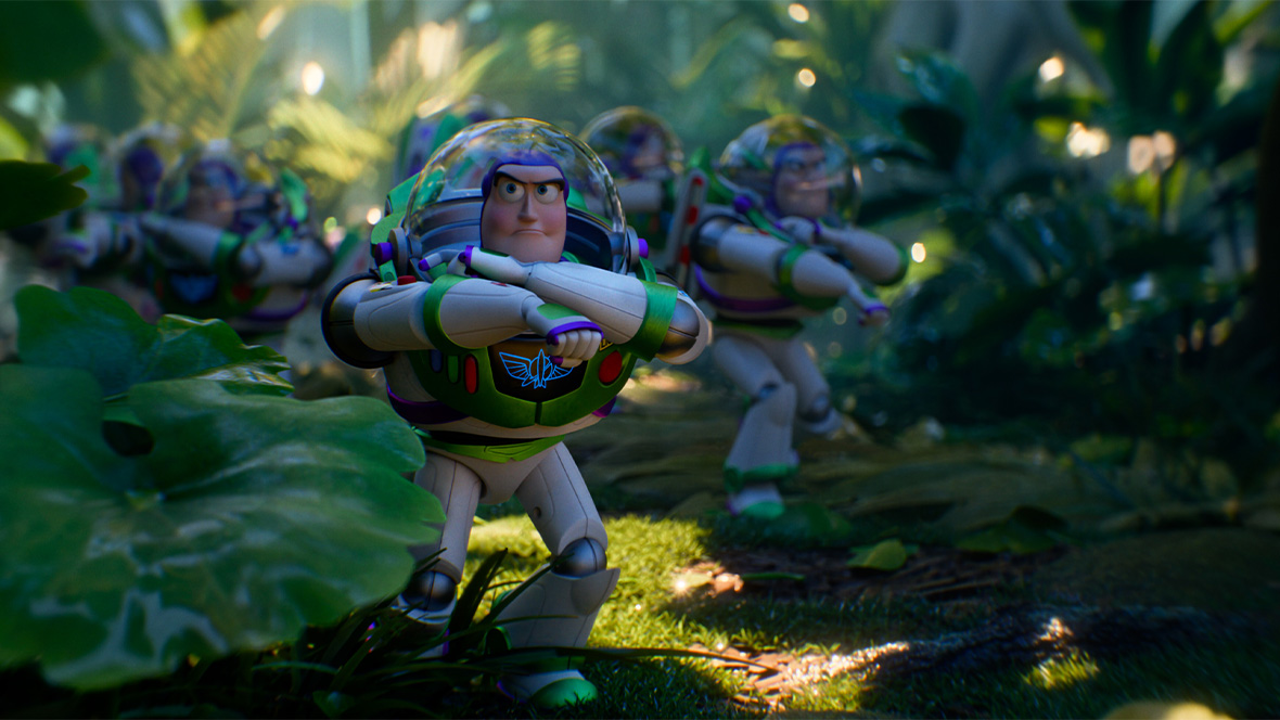 In an image from Disney and Pixar&rsquo;s Toy Story 5, several Hi-Tech Edition Buzz Lightyears are seen walking through leaves and other greenery.