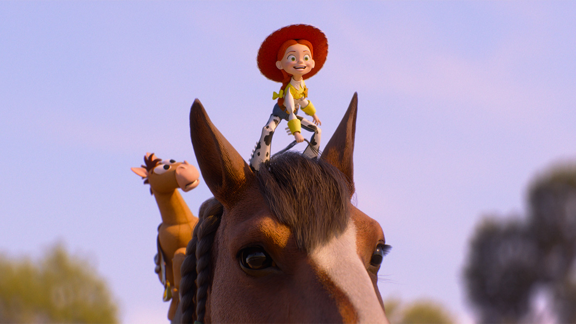 In an image from Disney and Pixar&rsquo;s Toy Story 5, Jessie (voiced by Joan Cusack) is standing on the back of a horse, while Bullseye looks on behind her.