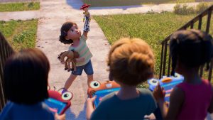 In an image from Disney and Pixar&rsquo;s Toy Story 5, Bonnie (voiced by Scarlett Spears) is holding Jessie aloft in one hand, and holding Bullseye in another, and she stands in front of three young girls who are sitting&mdash;with their backs to the camera&mdash;on a front door stoop.