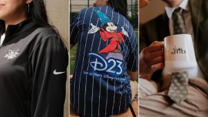 D23-branded merchandise including a Nike quarter-zip jacket, Sorcerer Mickey baseball jersey, and Walt&rsquo;s Office mug displayed in a collage.