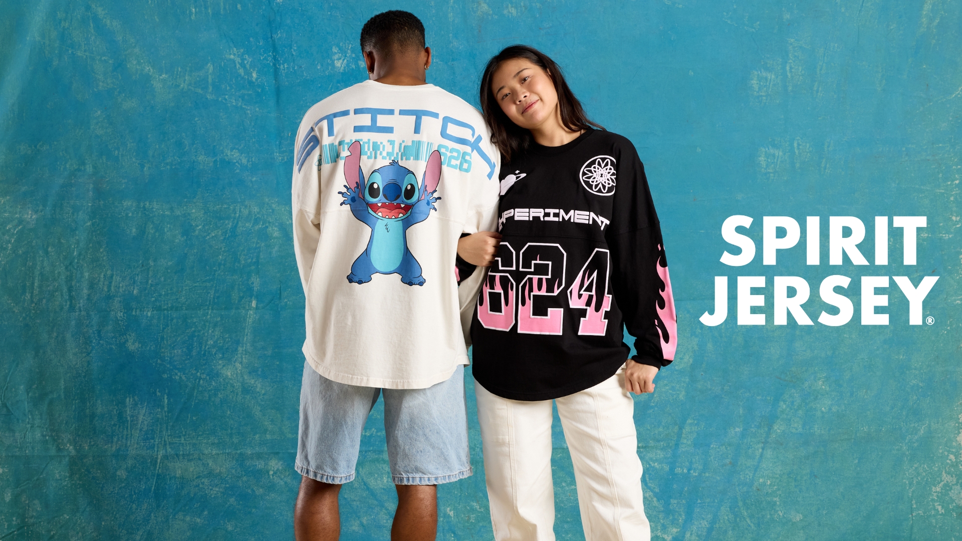Two models wearing Disney exclusive Spirit Jerseys.