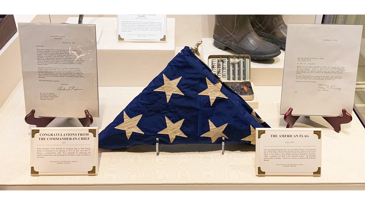 An image of the American Flag gifted by the President of the United States for the grand opening and dedication ceremony of Magic Kingdom, courtesy Walt Disney Archives.