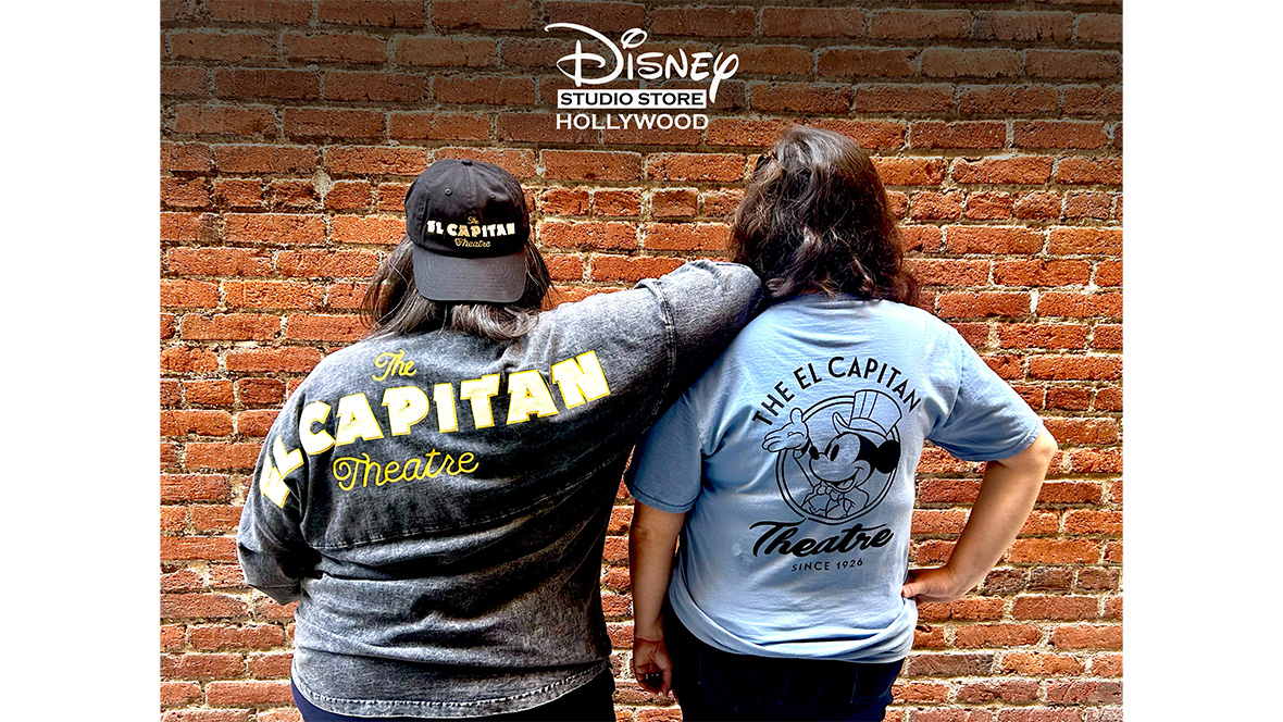 An image of the back of two people wearing items that will be available at Disney Studio Store Hollywood—one of the stores at D23: The Ultimate Disney Fan Event 2026.