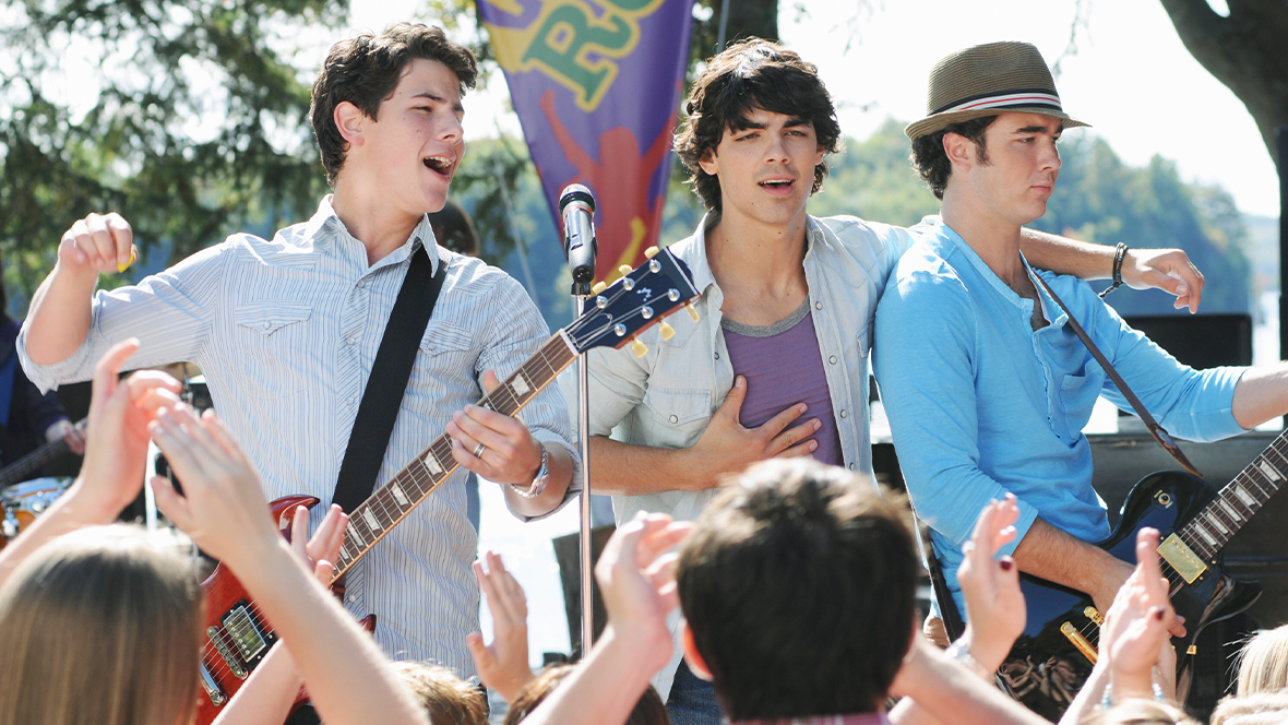 Disney Legends Nick Jonas, Joe Jonas, and Kevin Jonas perform as Connect 3 in a scene from Camp Rock 2: The Final Jam.
