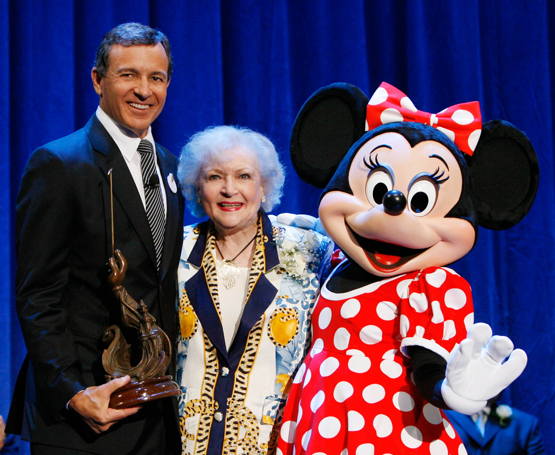 D23 EXPO - DISNEY LEGENDS AWARDS - Anaheim, California (September 10, 2009) - Men and women who have contributed to the creative legacy of The Walt Disney Company were honored in a special presentation, hosted by Tom Bergeron and open to all D23 Expo guests. BETTY WHITE has become a television icon, especially for her role as slightly befuddled, always charming Rose Nylund in The Golden Girls - for which she received one of her six Emmy Awards.  White has also been a key cast member in such hit TV shows as The Mary Tyler Moore Show, The Golden Palace, The Practice and her own series, The Betty White Show.  She has been seen in 19 films and has long supported many animal-rights organizations. (DISNEY-ABC TELEVISION GROUP/ADAM LARKEY)
ROBERT IGER (PRESIDENT AND CEO, WALT DISNEY COMPANY), BETTY WHITE, MINNIE MOUSE