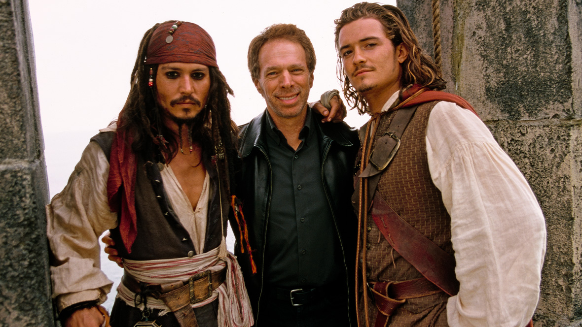Disney Legend Johnny Depp, Disney Legend Jerry Bruckheimer, and Orlando Bloom on the set of Pirates of the Caribbean: The Curse of the Black Pearl