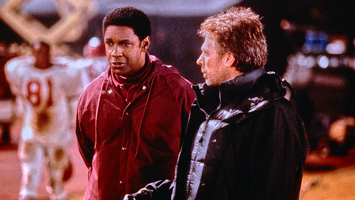 Denzel Washington and Disney Legend Jerry Bruckheimer on the set of Remember the Titans