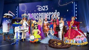 A group shot of contestants from the D23 2026 Mousequerade costume contest at D23: The Ultimate Disney Fan Event.
