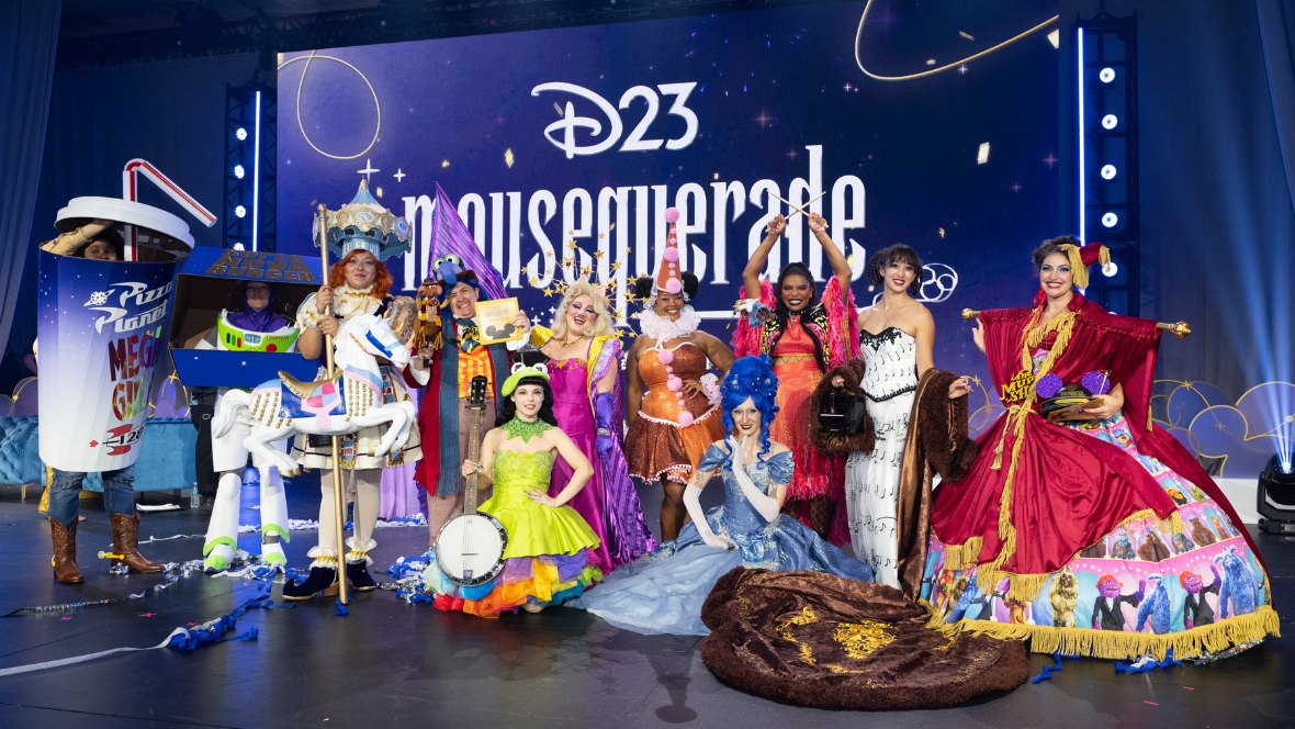 A group shot of contestants from the D23 2026 Mousequerade costume contest at D23: The Ultimate Disney Fan Event.