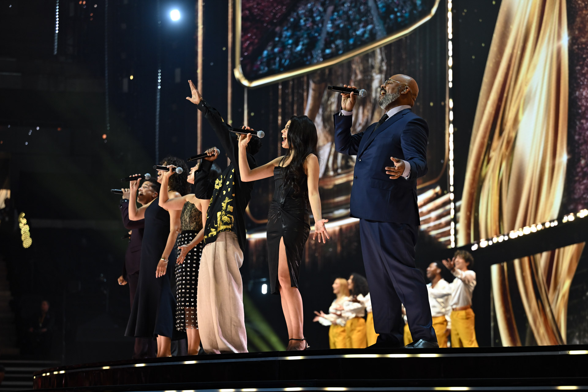 Performers from Hamilton sing onstage during the 2026 Disney Legends Awards ceremony tribute performance.