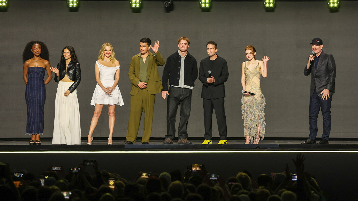 An image of the cast of the upcoming X-Men film, on stage at the Honda Center during the Disney Entertainment Showcase at D23: The Ultimate Disney Fan Event—including Sadie Sink, Kit Connor, Christopher Abbott, Samara Weaving, Inde Navarrette, and Maya Boyd, along with director Jake Schreier and Marvel Studios president Kevin Feige.
