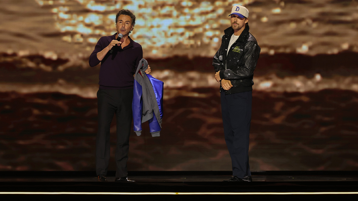 An image of Star Wars: Starfighter director Shawn Levy and star Ryan Gosling, on stage at the Honda Center during the Disney Entertainment Showcase at D23: The Ultimate Disney Fan Event.