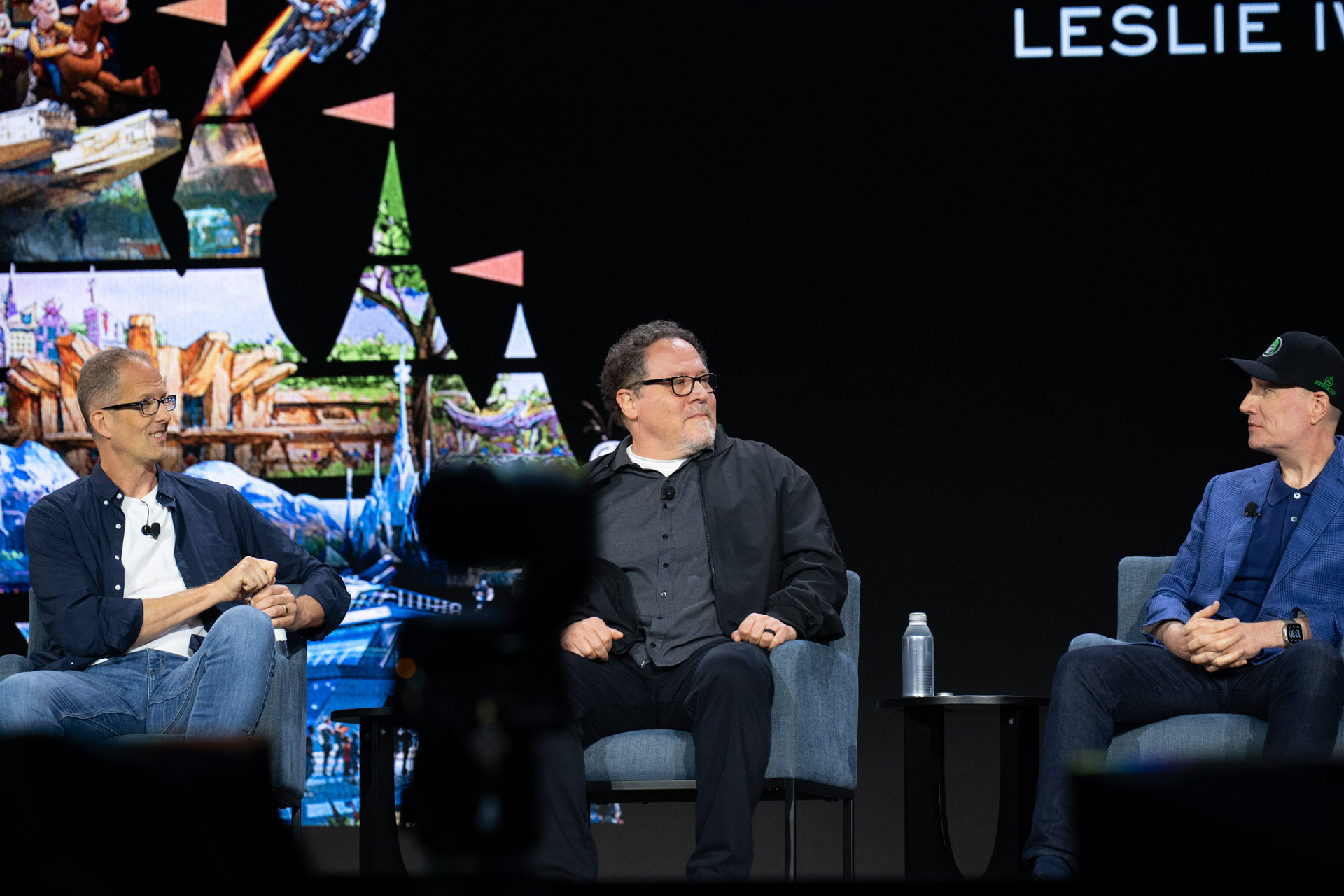 From left to right, Pete Docter, Chief Creative Officer of Pixar; Disney Legend Jon Favreau, director of Star Wars: The Mandalorian and Grogu; and Kevin Feige, President, Marvel Studios, and Chief Creative Officer, Marvel, sit on stage during the Disney Worldbuilders panel during D23: The Ultimate Disney Fan Event 2026.
