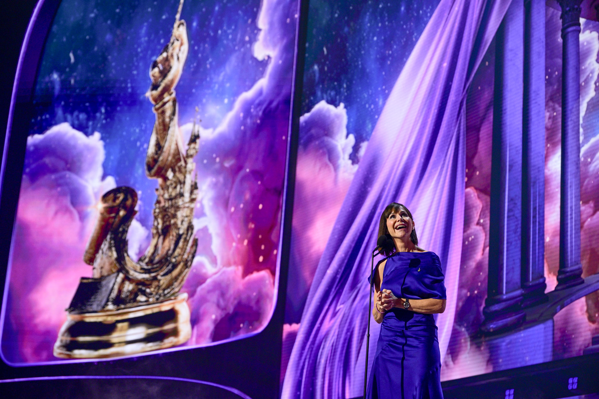Susan Egan speaks onstage during a tribute presentation at the 2026 Disney Legends Awards ceremony.