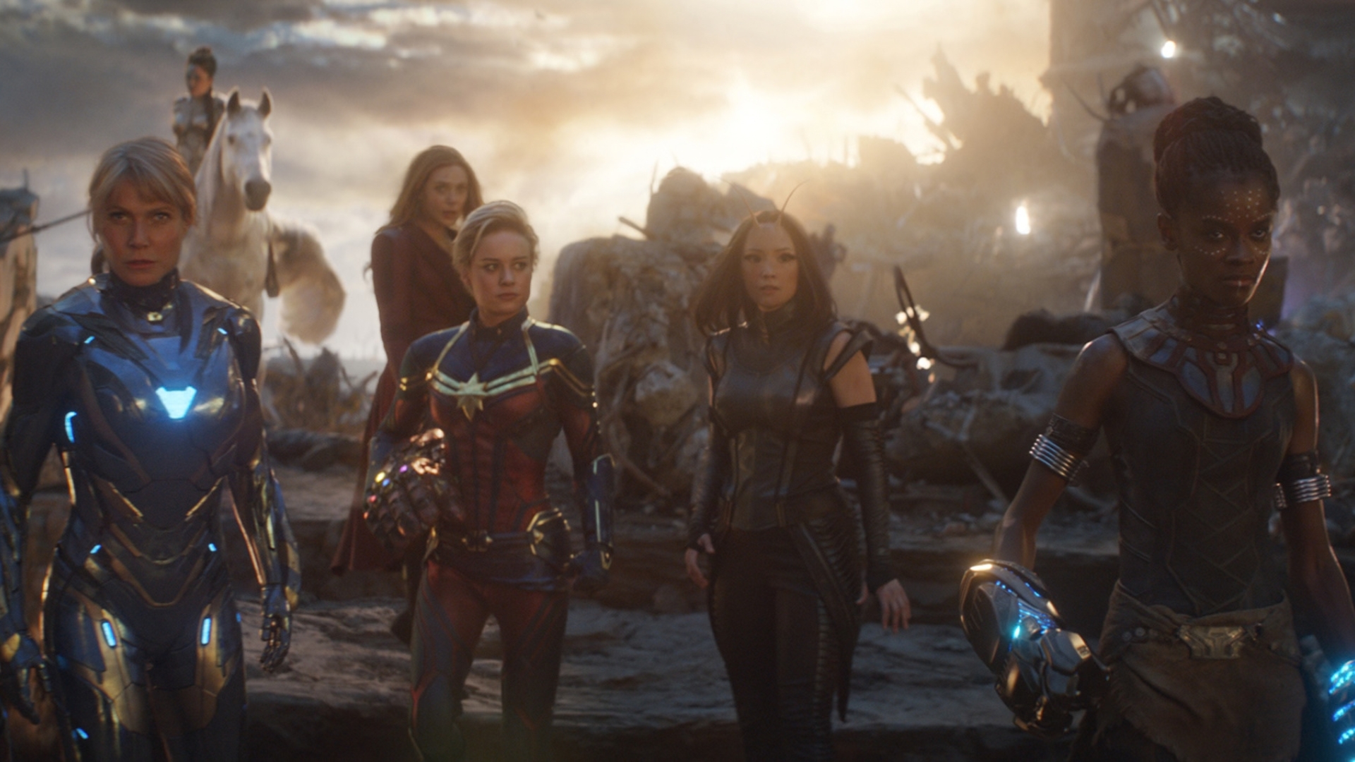 Pepper Potts/Rescue, played by Gwyneth Paltrow, Valkyrie, played by Tessa Thompson, Wanda Maximoff/Scarlet Witch, played by Elizabeth Olsen, Carol Danvers/Captain Marvel, played by Brie Larson, Mantis, played by Pom Klementieff, and Shuri, played by Letitia Wright, stand together in a scene from Avengers Endgame: Encore.