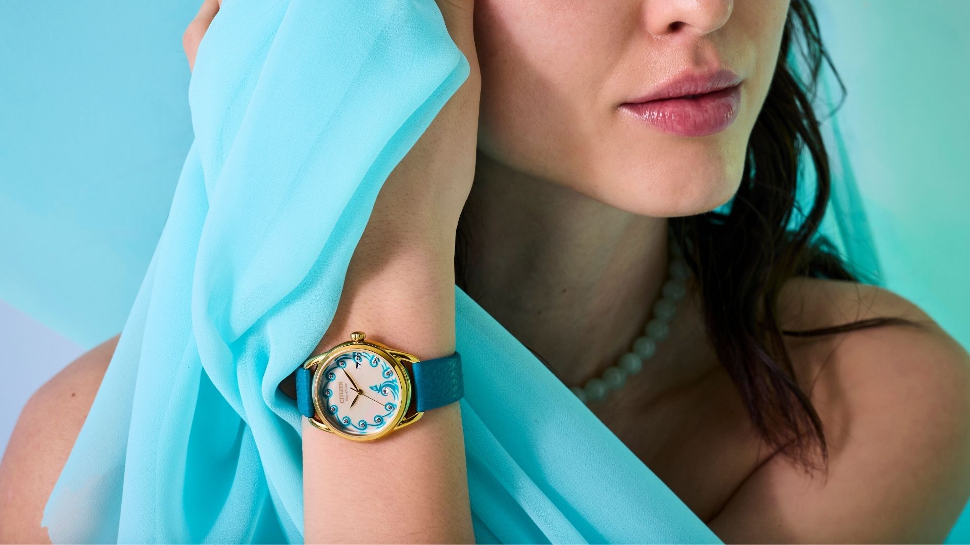 A model wearing a Disney Citizen watch.