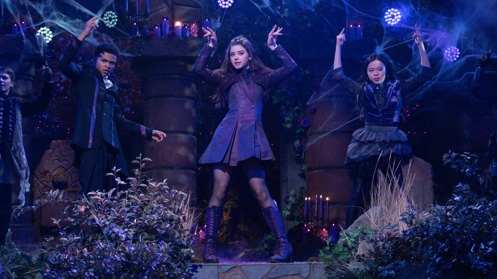 A promotional image from season 2 of Vampirina: Teenage Vampire; Vee (Kenzi Richardson) is seen performing on stage. 